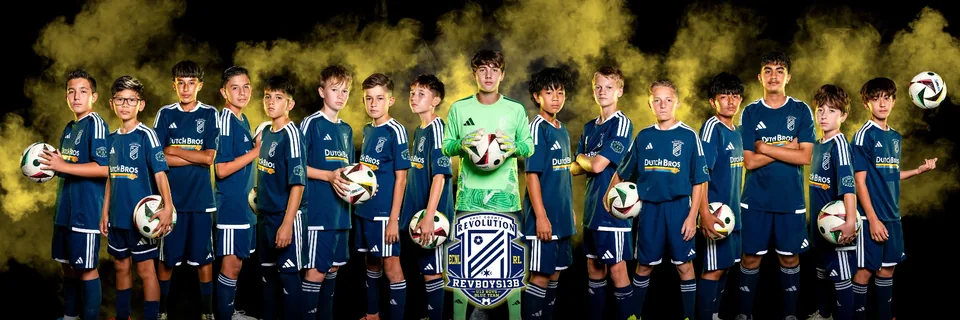 EC Revolution U13 Boys Blue — full squad presentation photo in the navy kit with the REVBOYS13B crest